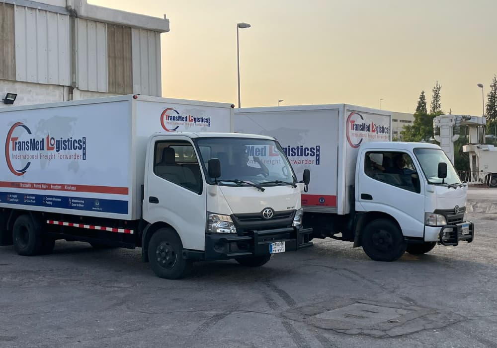 TransMed Logistics branded delivery trucks